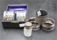Pair of cased sterling silver napkin rings