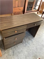 particle board desk- dark colored