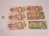 5 billets 2 $ Canada et un billet de 1$