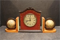 Two Worldly Bookends and a Colonial Clock