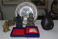 Four oriental figurines, a vase, stone chop