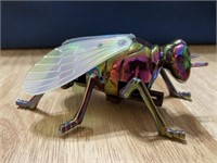 Colorful wind up fly.