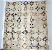 Quilt, patchwork, fine quilting, brown patches are