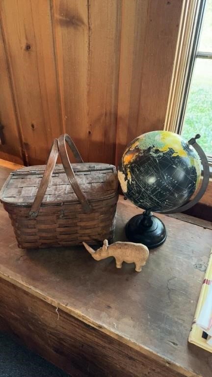 Small 12 inch world globe, a carved wood