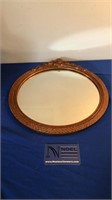 Antique gold rounded mirror
