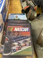 Three DVDs two NASCAR and one elf movie