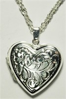 $180. St.Sil Heart Locket Necklace
