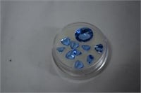 10.60ctw Tanzanite Trillions and One Oval Stone