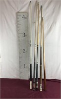 Five Pool Sticks