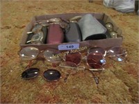 Box of eye glasses and cases