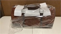 Brown suede duffle bag still in packaging. 21” L