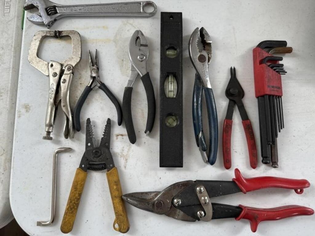 Tin snips, crescent wrench, pliers, miscellaneous