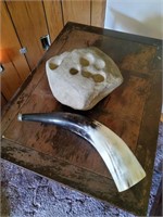 Large dented rock and viking horn