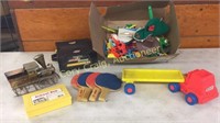 Lot of kids toys. Ping pong paddles, truck, misc.