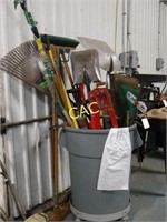 Garbage Can Full of Outdoor Tools