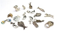 Group of various Silver charms / pendants