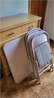 4 folding chairs and matching card table