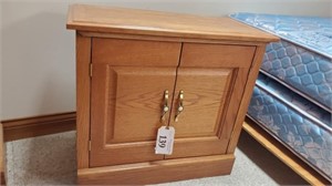 Two-door cabinet, end table.