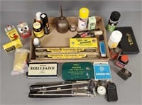 Group of gun related items, cleaning rods, oil