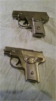 Two Dick cap guns