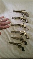 Miniature guns