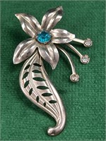 Vintage flower brooch w/ blue & clear rhinestones