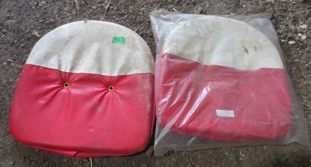 2 red & white seat cushions