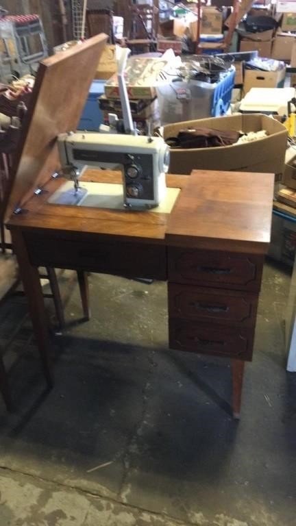 Sewing machine in cabinet