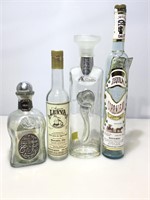 Assorted glass decanters.