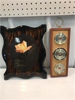 Barometer and wooden plaque