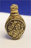 A Carved Resin Snuff Bottle