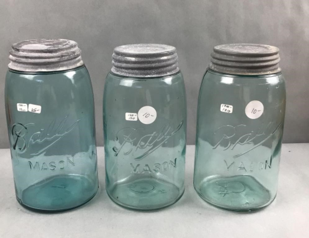 3 blue ball mason jars with bubbles