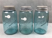 3 blue ball mason jars with bubbles