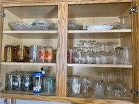 CABINET OF GLASSWARE IN KITCHEN