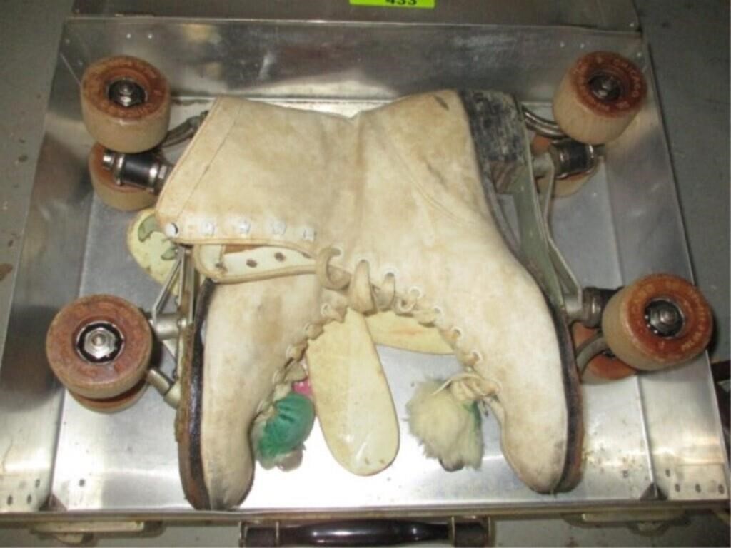 Vintage roller skates in case