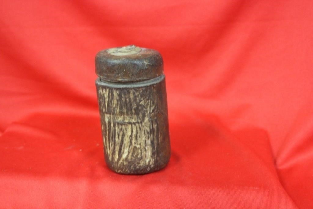 An Old Leather Wrap on Wood Container