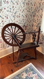 Antique colonial designed spinning wheel, looks