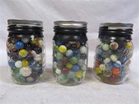 Group of 3 jars of marbles