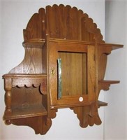 Folk Art curio cabinet with 5 galleries and