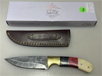 NIB fixed blade Damascus knife.