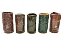 Set of signed stoneware drinking cups