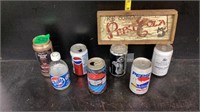 Assortment Of Cans and Wood Sign