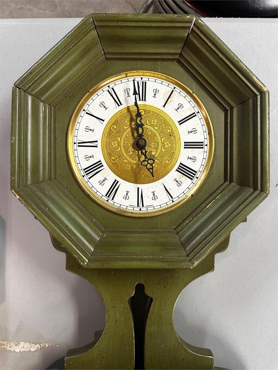 Vintage wall clock with shelf