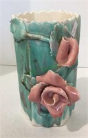 Antique ceramic glazed overlay with applied rose
