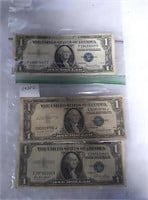 2 1935 e one dollar bills and a 1936 g one dollar