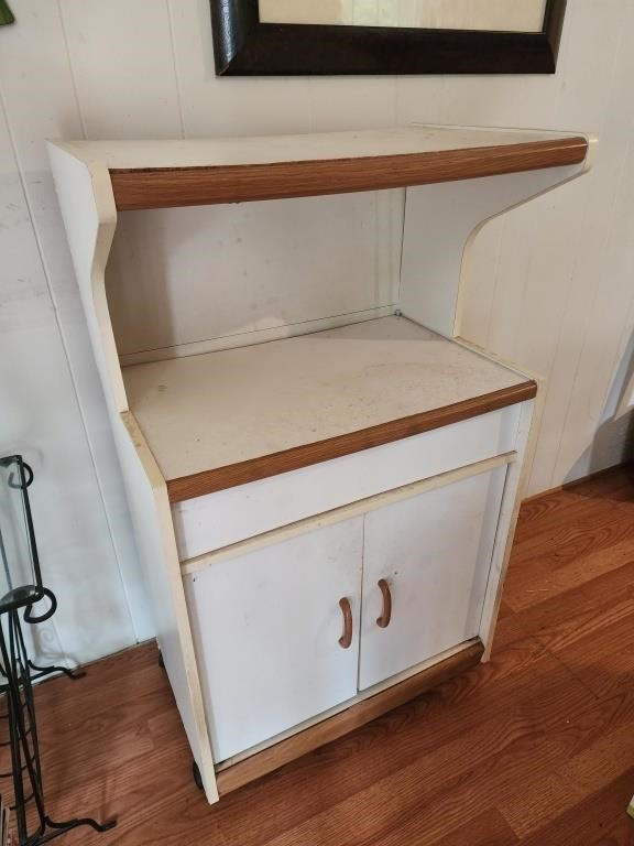 25x42x17 white microwave stand has wear