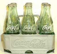 ALUMINUM SIX PK COKE CARRIER AND A