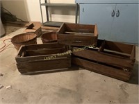 (3) wooden advertising crates and (2) baskets