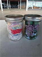 2 mason jars with yarn and more