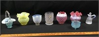 Various colored glass items